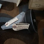 (1130) Nos Oem Ford Motorcraft Pulley & Bracket E79Z-8678-A, 502Z-8680-B New. Price: $10.00.